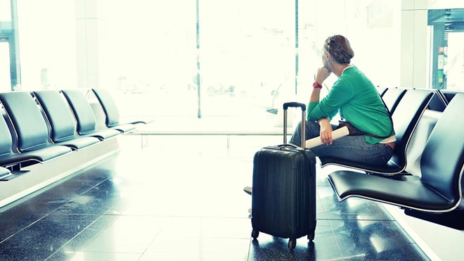 traveller waiting at airport